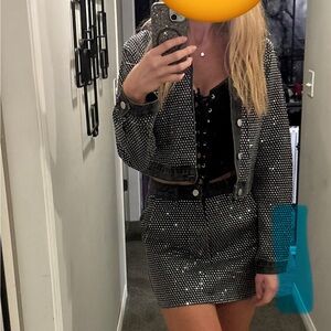 Dark denim jacket and mini skirt with rhinestones
